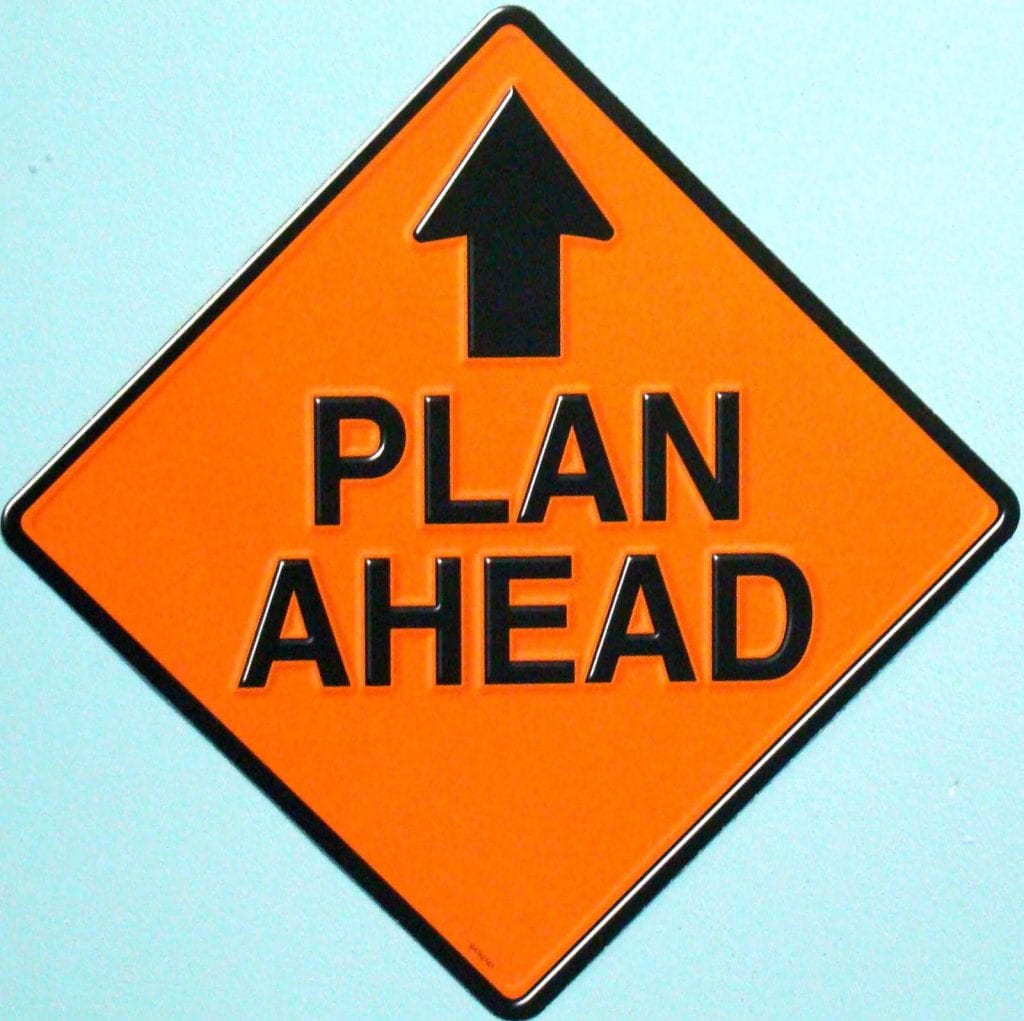 Image of a street sign that says Plan Ahead on it