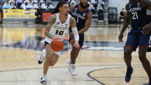 Point guard Alyn Breed dons the Friar jersey with the BLM patch