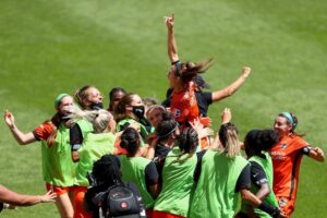 The Houston Dash celebrate their championship.