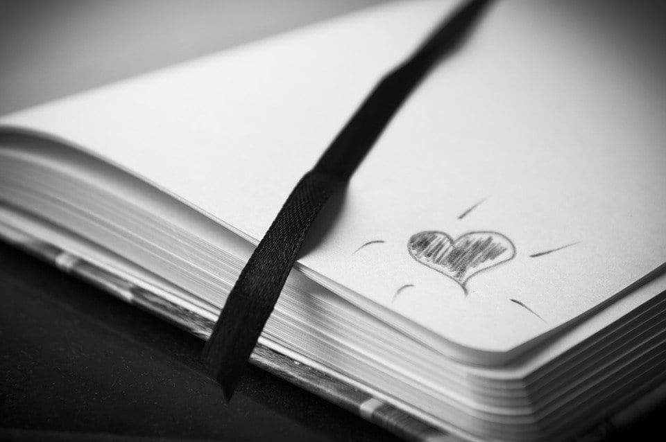 A little heart drawn on a poetry book