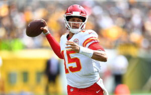 Patrick Mahomes throws football.