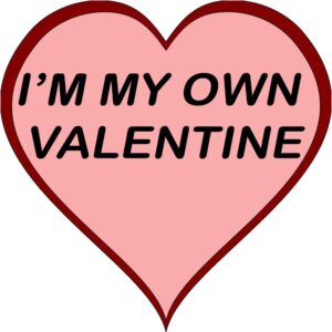 A candy heart that says "I'M MY OWN VALENTINE"