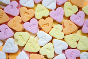 Candy hearts in a pile