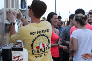A member of Providence College's BOP serves food from Haven Brothers at Clam Jam.
