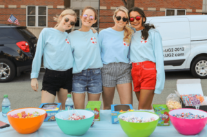 Students enjoy frozen lemonade, fried dough, and kettle corn at Clam Fest.