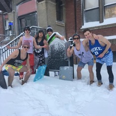 A group of residents from St. Joseph Hall at Providence College underdressed in shorts and shirts for the winter storm