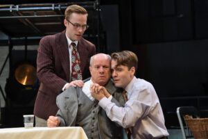 Billy Hutto (left), Stephen Berenson (center), and Matt Lytle (right) star in Death of a Salesman.