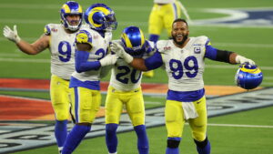 Aaron Donald celebrates with his teammates after stopping the Bengals on 4th & 1, sealing the victory for the Rams. 