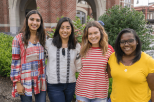 A photo of four female executive board members