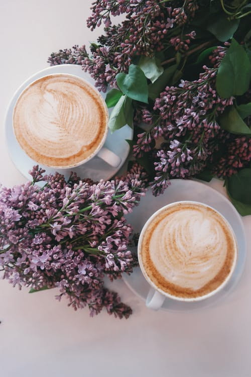 two mugs filled with coffee