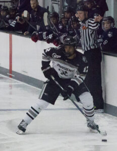 pc mens hockey player erik foley