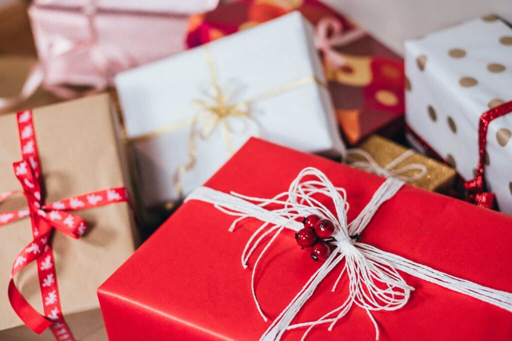 wrapped gifts in a pile 