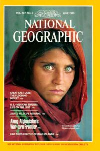 The iconic photo of a 12 year old girl in a refugee camp in Pakistan, shot by Steve McCurry for National Geographic