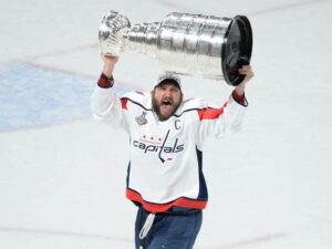alex ovechkin hoists the stanley cup for the first time