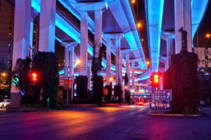 blurry red lights at a traffic intersection