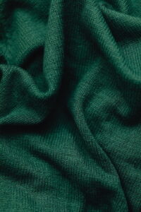 a green sweater