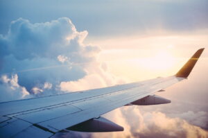 airplane wing and clouds