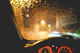 rainy car windshield at night