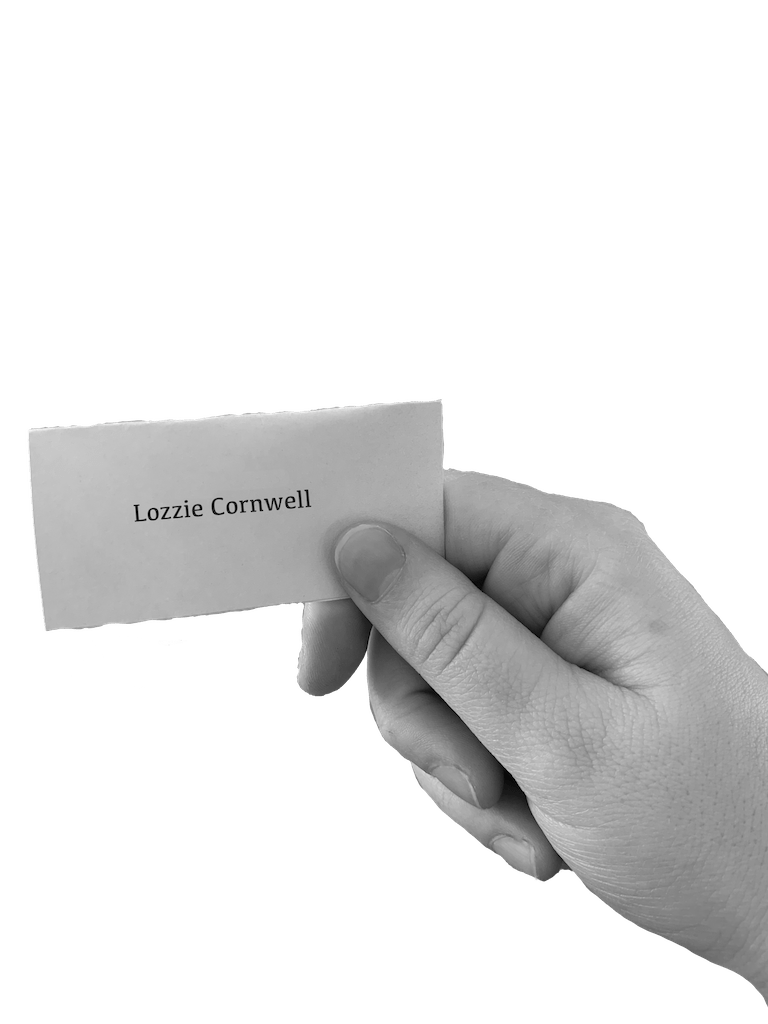 hand holding a piece of paper
