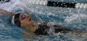 Antigone Rigas '19 competes in the backstroke during a meet.