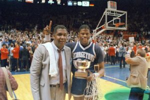 Coach John Thompson celebrate with Patrick Ewing after their National Championship.