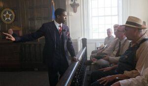A scene from the movie Marshall of Chadwick Brown in court in front of an all white jury