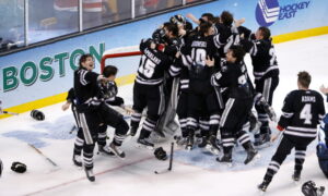 Hockey team celebrating after championship